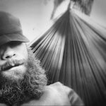 Portrait photo(black and white) of Cole Gillespie.